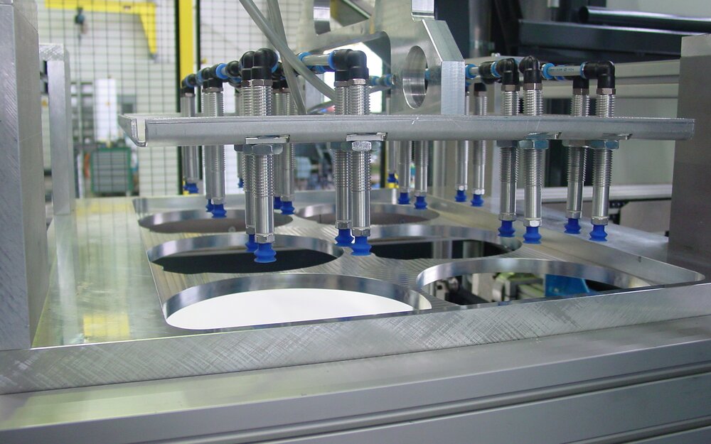 Thermoformmaschine - Stapelung Thermoformmaschine - Stapelung