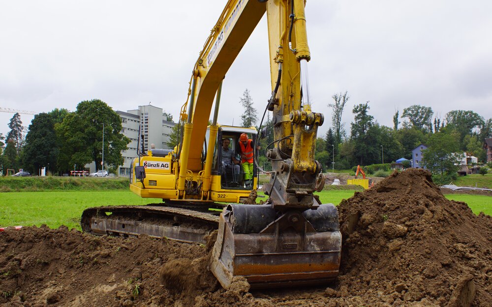 Excavatorin the green