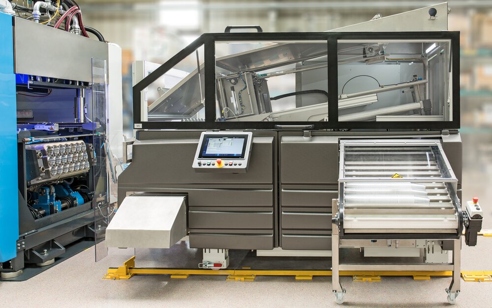 Thermoforming Stacking solution - Pick-up Stacker Thermoforming Stacking solution - Pick-up Stacker