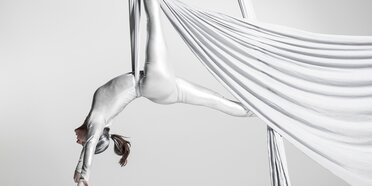 Woman dancing on fabric