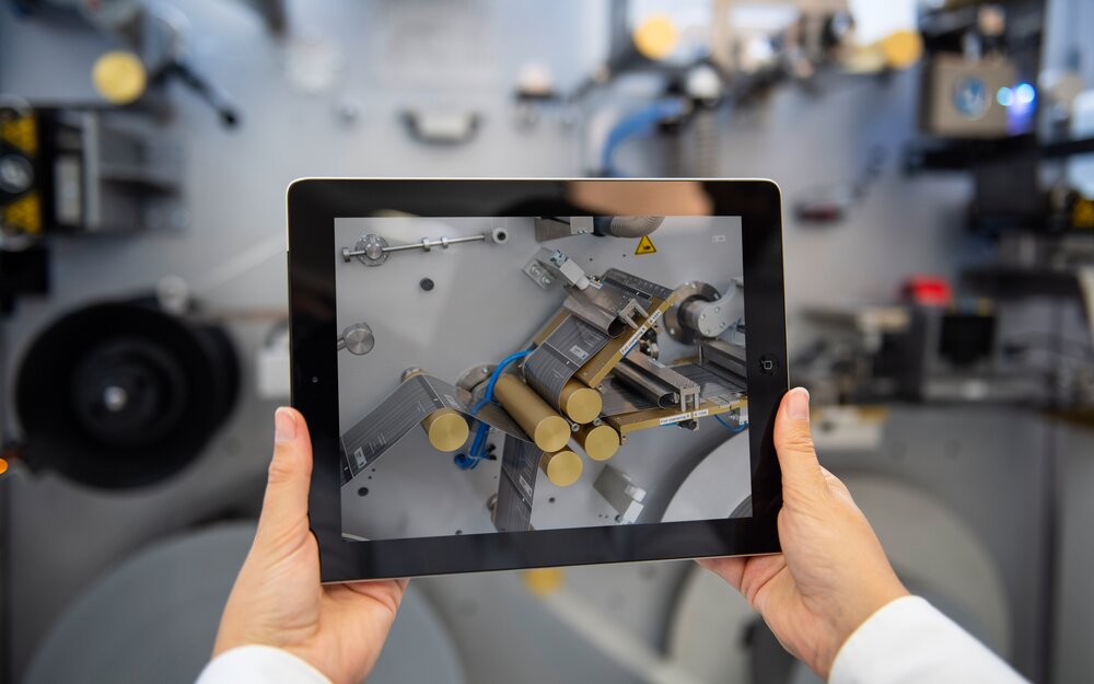Holding tablet in front of LTR2 machine