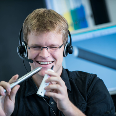 Discussing tube samples with customer on the phone