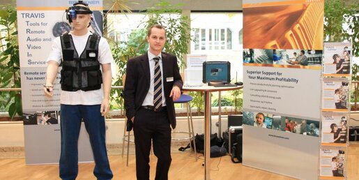 Markus Sippl, Product Manager TRAVIS, presents the TRAVIS tools Callisto (left) and Mentor (right) at the Maschinenbauforum 2011 in Pforzheim, Germany
