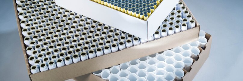 Aluminum tubes and cans in boxes