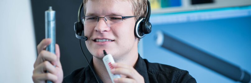 Man discussing tubes on the headset