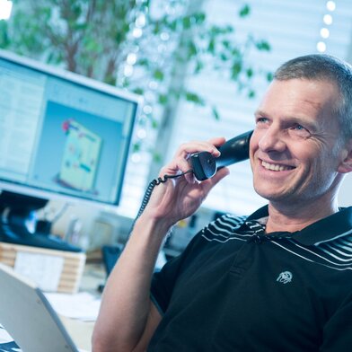 Man in customer service on the phone