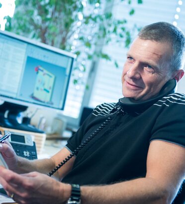 Man on the phone with customer