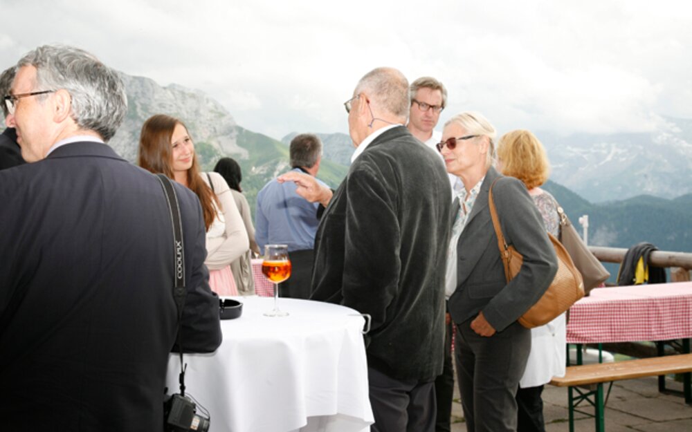Discussing the events of an interesting day on top Bavaria's beautiful mountains 
