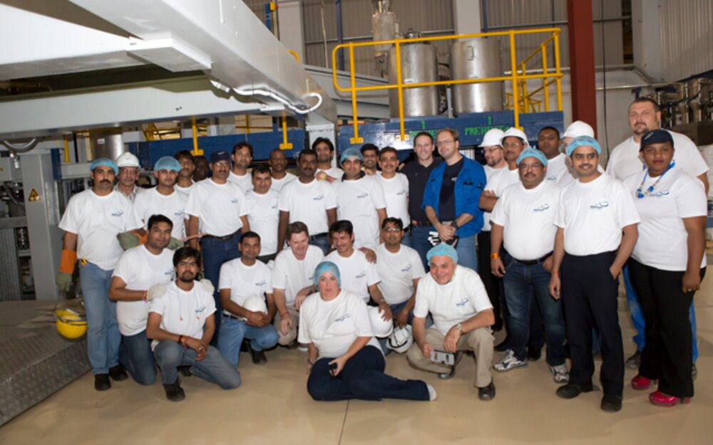 SRF Senior Vice President Hari K  Singh amongst his staff and the Brückner Team: all were absolutely happy with the smooth and successful cooperation

