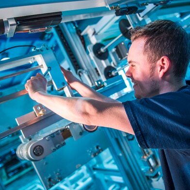 Service engineer working on machine